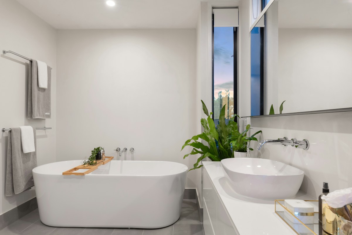 Bathroom design inspiration with a soaking tub and modern vanity